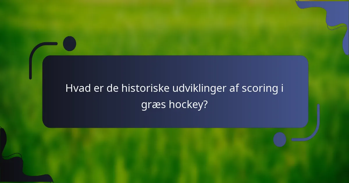 Hvad er de historiske udviklinger af scoring i græs hockey?